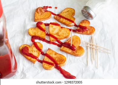 Preparing a food for Valentine's Day abstract love concept witch french fries chips heart shape - Powered by Shutterstock