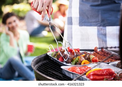 Preparing food for a vegetarian during barbecue - Shutterstock ID 416321323
