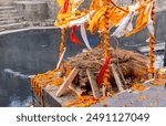 Preparing of Funeral pyre at the Pashupatinath temple complex on Bagmati River, Kathmandu Valley, Nepal