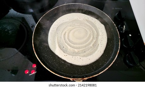 Preparing Home Made Dosa On Non Stick Dosa Pan