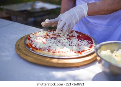 Preparing Italian Food In A Park Pizza Spagetti Salad