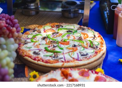 Preparing Italian Food In A Park Pizza Spagetti Salad