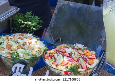 Preparing Italian Food In A Park Pizza Spagetti Salad