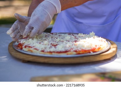 Preparing Italian Food In A Park Pizza Spagetti Salad