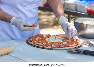 Preparing Italian Food In A Park Pizza Spagetti Salad