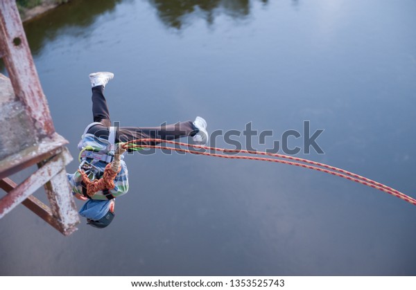 Preparing to jump from the bridge, fear of\
jumping, equipment for\
jumping