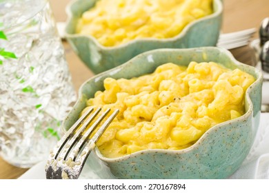 Preparing Macaroni And Cheese With Elbow Macaroni.