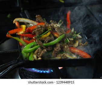 Preparing Mexican Sizzling Fajitas