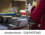 Preparing organic bread with people in the kitchen