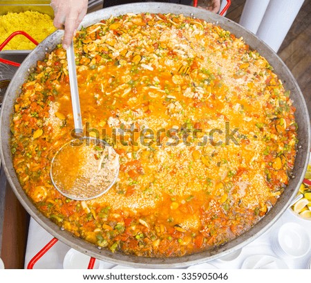 preparing paella