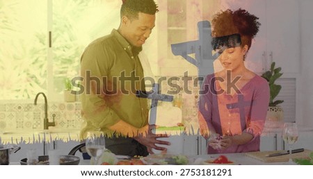 Preparing pair in olive, mauve, using white mixer, cracking egg at kitchen island, purple overlay. Couple, countertop, modern, bright, plants, vegetables, cuttingboard