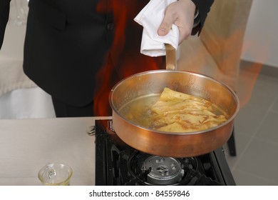 Preparing Pancakes Flambé