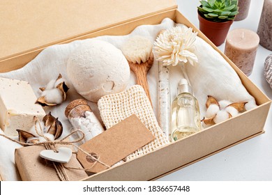 Preparing self care package, seasonal gift box with plastic free zero waste cosmetics products. Personalized eco friendly basket for family and friends for thankgiving, christmas, mothers day  