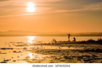 Preparing a selfie at sunset