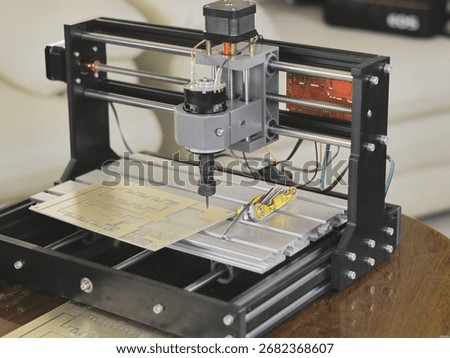 Preparing a small CNC machine for engraving printed circuit boards (PCBs)
