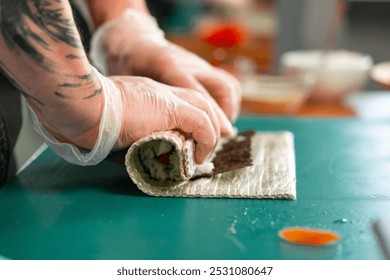 Preparing sushi rolls with fresh ingredients at a culinary studio - Powered by Shutterstock