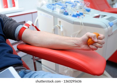 Preparing For Taking Blood From The Vain. Arm Pressing A Ball For Better Blood Pressure