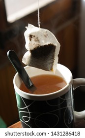 preparing the tea in a sack in a cup.