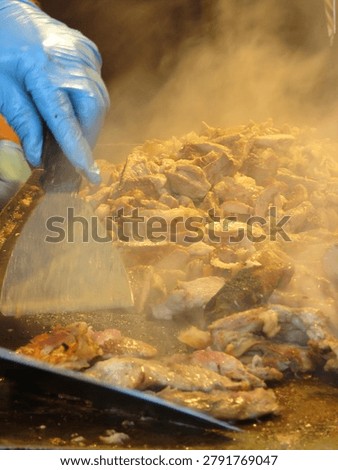 Preparing thin meat slice shavings from Kebab Gyro Shawarma cutt