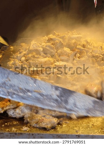 Preparing thin meat slice shavings from Kebab Gyro Shawarma cutt