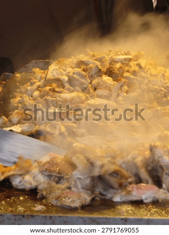 Preparing thin meat slice shavings from Kebab Gyro Shawarma cutt