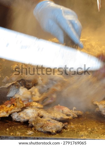Preparing thin meat slice shavings from Kebab Gyro Shawarma cutt