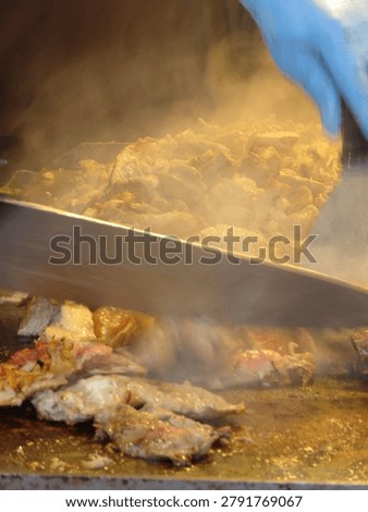 Preparing thin meat slice shavings from Kebab Gyro Shawarma cutt