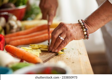 Preparing vegetables.Senior woman hands. - Powered by Shutterstock