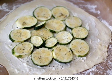 Preparing Zucchini And Courgette Galette With Herbs And Spices. Selective Focus.