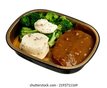 Prepped meal serving in tin container. Chopped Beef Steak with Mashed Potatoes, Gravy, and Broccoli. Isolated on white.