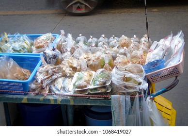 Pre-prepared Meals Ready Bagged For Sale On A Cart In The Streets Of Bangkok