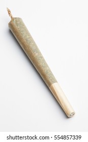 Pre-rolled marijuana joint on white background