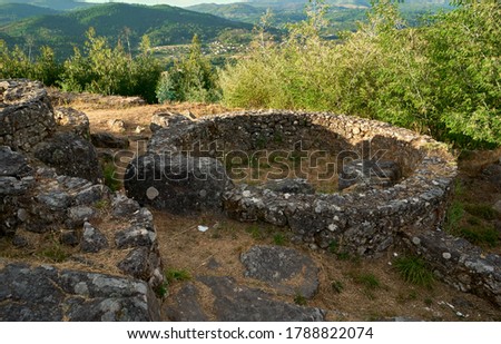 pre-roman stone constructions where the Celts lived surrounded by vegetation