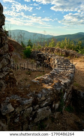 pre-roman stone constructions where the Celts lived surrounded by vegetation