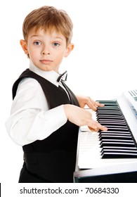 Preschool Boy Playing Piano, Isolated