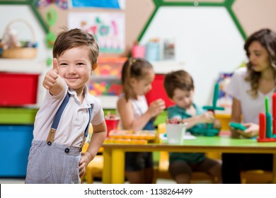 Preschool Children and Teacher in Classroom - Shutterstock ID 1138264499