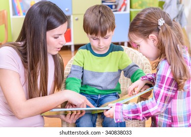 Preschool Teacher Reading Book Boy Girl Stock Photo 340838033 ...