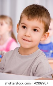 Preschooler Boy 4 Years Old Listening A Lesson In Classroom