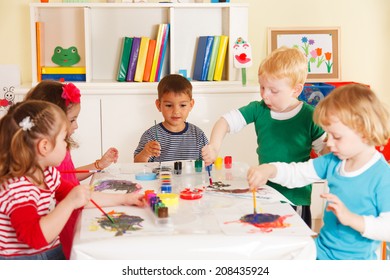 Preschoolers in the classroom working together - Shutterstock ID 208435924
