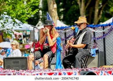 Prescott, Arizona, USA - July 3, 2021: Blues musicians performing on a float in the 4th of July parade