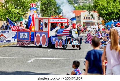 Prescott, Arizona, USA - July 3, 2021: Red, white and blue float made to look like a train in the 4th of July parade
