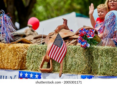 Prescott, Arizona, USA - July 3, 2021: Western Saddle with an American flag on a float in the 4th of July parade