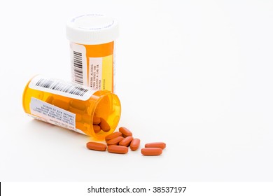 Prescription Bottles And Pills On White Background - Copy Space RIGHT