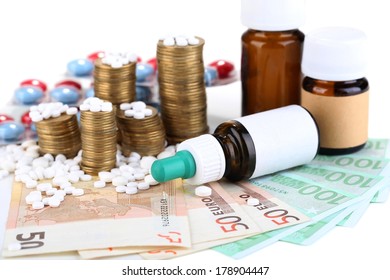 Prescription Drugs On Money Background Representing Rising Health Care Costs. Isolated On White