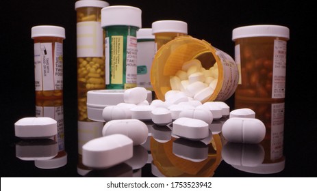 Prescription drugs and opioids on table top viewing up close.