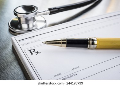 a prescription form and stethoscope in a doctor's office