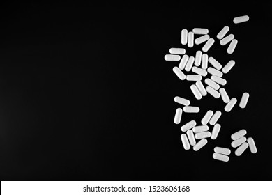 Prescription opioid oval pills. Opioid crisis. Opioid epidemic. Synthetic opiates. Sport nutrition. Protein close up. 