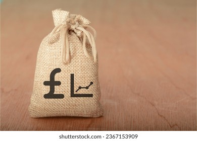 The presence of a money bag, pound symbol, and fluctuating graph raised suspicions of financial instability and potential currency fluctuations, prompting further scrutiny - Powered by Shutterstock