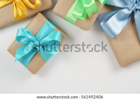 present boxes on white background shot from above, border composition