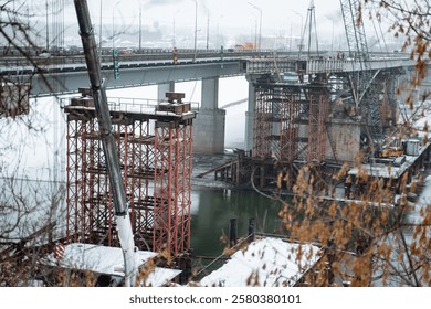 At the present time, a bridge is actively being built over a vast expanse of water in order to enhance transportation options and significantly improve the connectivity within the region